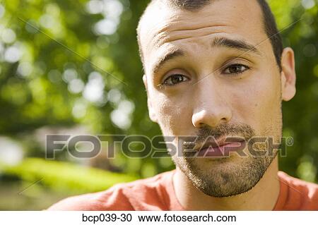 Closeup of young man outdoors View Large Photo Image Stock Image - Closeup of young man outdoors. Fotosearch