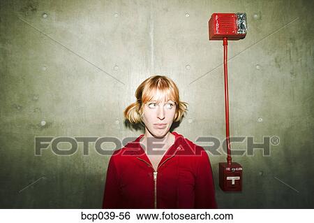 Concerned young woman looking away View Large Photo Image Stock Photograph - Concerned young woman looking away. Fotosearch