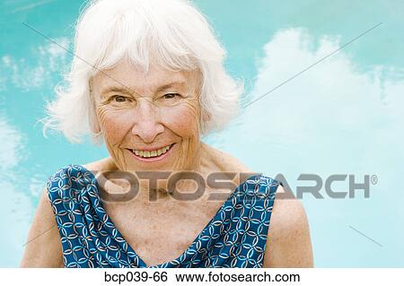 Portrait of a senior woman outdoors View Large Photo Image Stock Photograph - Portrait of a senior woman outdoors. Fotosearch