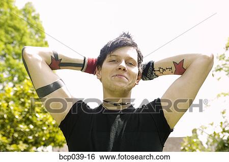 Portrait of a young man View Large Photo Image Stock Photograph - Portrait of a young man. Fotosearch
