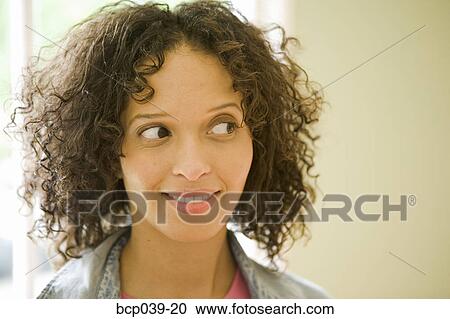 Stock Image - Portrait of a young woman. Fotosearch