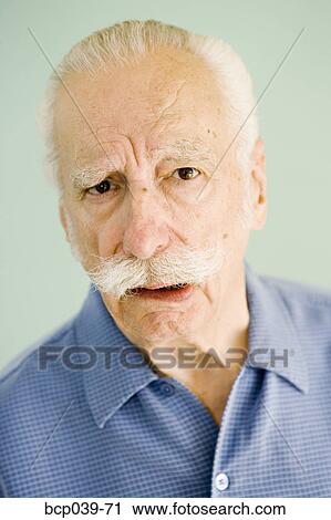 Portrait of concerned older man View Large Photo Image Stock Image - Portrait of concerned older man. Fotosearch