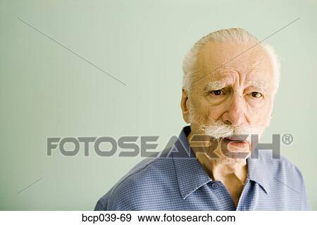 Portrait of concerned older man View Large Photo Image Stock Photo - Portrait of concerned older man. Fotosearch