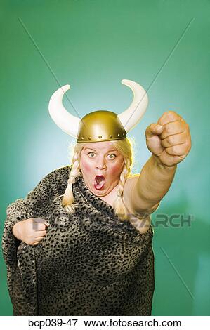 Powerful woman with upraised fist View Large Photo Image Stock Photo - Powerful woman with upraised fist. Fotosearch