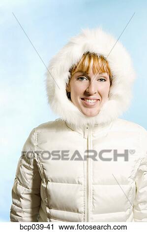 Woman dressed in winter jacket View Large Photo Image Stock Image - Woman dressed in winter jacket. Fotosearch