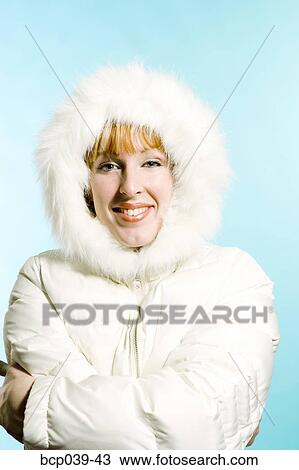 Woman dressed in winter jacket View Large Photo Image Stock Image - Woman dressed in winter jacket. Fotosearch