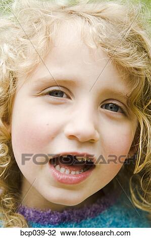 Young girl with a missing tooth View Large Photo Image Stock Image - Young girl with a missing tooth. Fotosearch