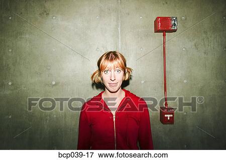Young woman staring straight ahead View Large Photo Image Stock Photo - Young woman staring straight ahead. Fotosearch