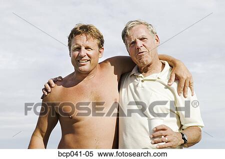 Father with his middle aged son View Large Photo Image Stock Photography - Father with his middle aged son. Fotosearch