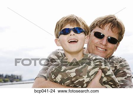 Portrait of affectionate father and son View Large Photo Image Picture - Portrait of affectionate father and son. Fotosearch
