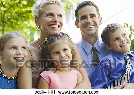 Portrait of family with three children View Large Photo Image Stock Image - Portrait of family with three children. Fotosearch