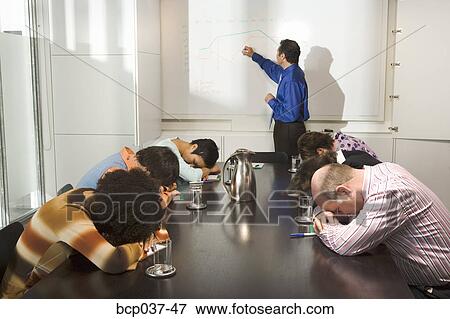 Co-workers falling asleep during presentation View Large Photo Image Stock Photo - Co-workers falling asleep during presentation. Fotosearch