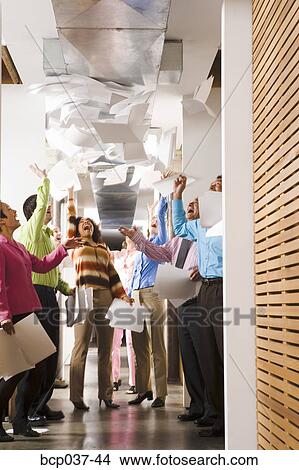 Picture - Happy business colleagues celebrating. Fotosearch