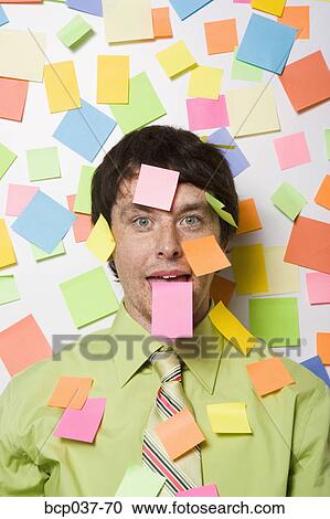 Male office worker covered with sticky notes View Large Photo Image Stock Image - Male office worker covered with sticky notes. Fotosearch