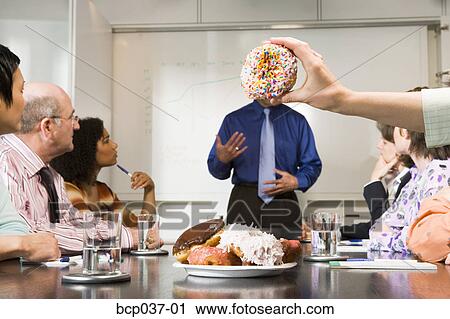 Mocking speaker during business meeting View Large Photo Image Stock Image - Mocking speaker during business meeting. Fotosearch