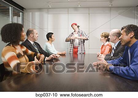 Weird co-worker at a meeting View Large Photo Image Stock Image - Weird co-worker at a meeting. Fotosearch