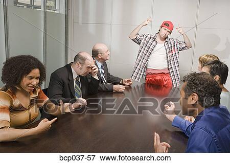 Weird co-worker at a meeting View Large Photo Image Stock Photo - Weird co-worker at a meeting. Fotosearch