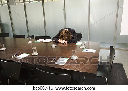 Woman asleep at conference table View Large Photo Image Stock Photography - Woman asleep at conference table. Fotosearch