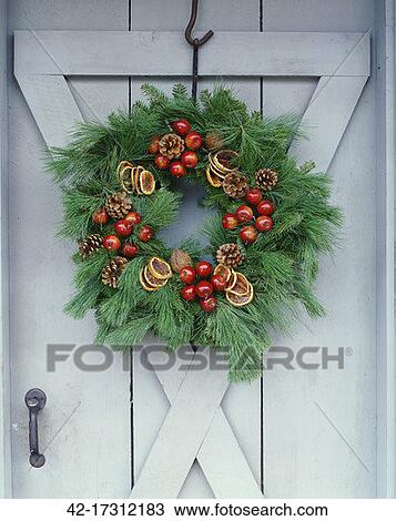 Stock Photo of Christmas Wreath on Door 42-17312183 - Search Stock ...