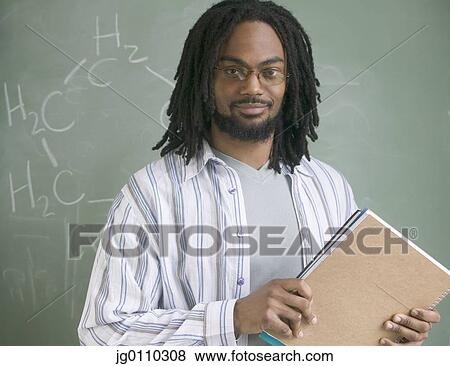 Stock Photo - Portrait of a young male teacher. Fotosearch