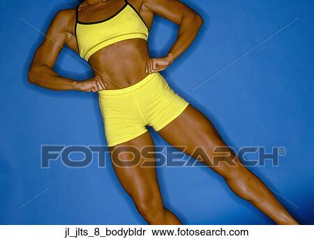 Close-up of a young female bodybuilder flexing her muscles View Large Photo Image Stock Photography - Close-up of a young female bodybuilder flexing her muscles. Fotosearch