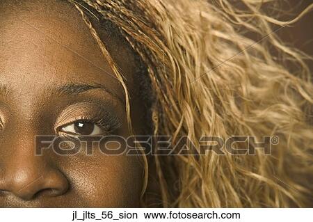 Picture - Close-up of a young woman's eye. Fotosearch