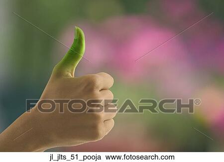 Close-up of a young woman's green thumb View Large Photo Image Stock Image - Close-up of a young woman's green thumb. Fotosearch