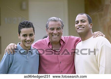Portrait of a senior man standing with his son and grandson View Large Photo Image Stock Image - Portrait of a senior man standing with his son and grandson. Fotosearch