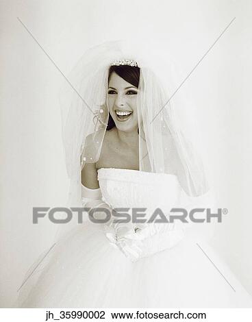 Portrait of a young bride laughing View Large Photo Image Stock Image - Portrait of a young bride laughing. Fotosearch