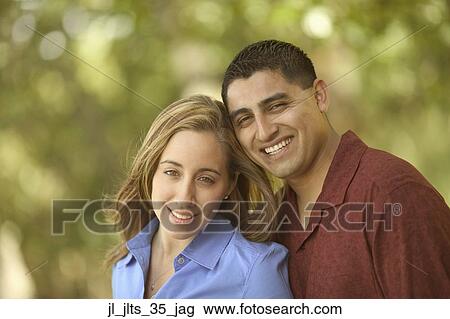 Stock Image - Portrait of a young couple. Fotosearch