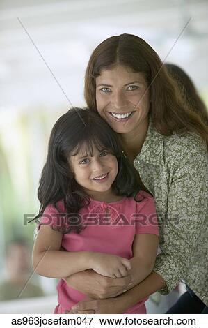 Portrait of a young woman and a young girl View Large Photo Image Stock Photo - Portrait of a young woman and a young girl. Fotosearch