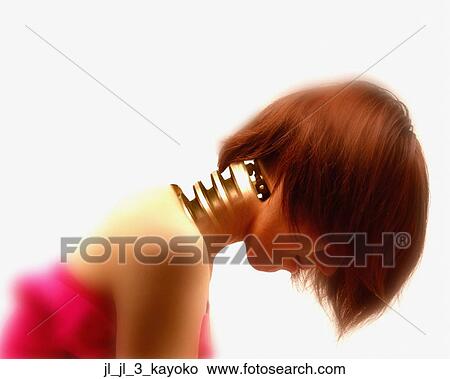Side profile of a young woman with her head down View Large Photo Image Picture - Side profile of a young woman with her head down. Fotosearch