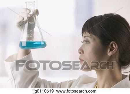 Female doctor examining tests View Large Photo Image Stock Photo - Female doctor examining tests. Fotosearch