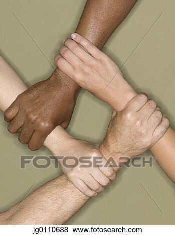 Stock Photo - Four human hands holding a wrist in sequence. Fotosearch