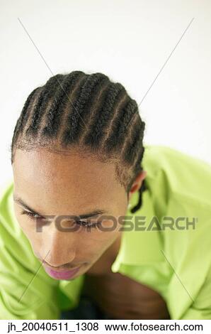 High angle view of a young man with braided hair View Large Photo Image Stock Photo - High angle view of a young man with braided hair. Fotosearch