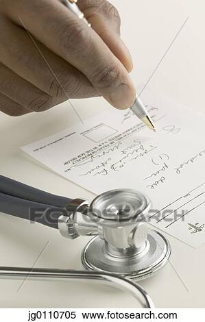Human hand holding a pen signing a cheque View Large Photo Image Stock Photography - Human hand holding a pen signing a cheque. Fotosearch