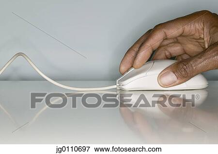 Human hand operating a computer mouse View Large Photo Image Stock Photo - Human hand operating a computer mouse. Fotosearch