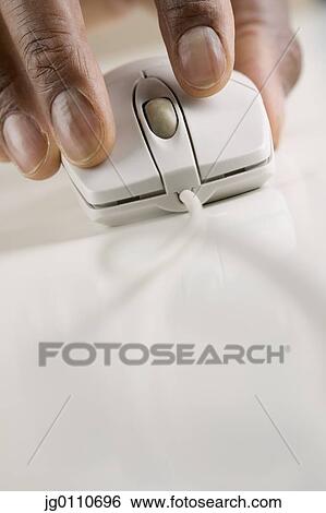Human hand operating a computer mouse View Large Photo Image Stock Photograph - Human hand operating a computer mouse. Fotosearch