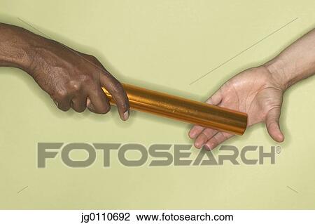 Persons hand passing a baton to another person View Large Photo Image Stock Image - Persons hand passing a baton to another person. Fotosearch