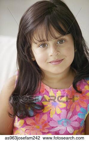 Portrait of a young girl smiling View Large Photo Image Stock Image - Portrait of a young girl smiling. Fotosearch