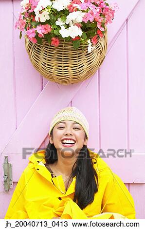 Portrait of a young woman smiling View Large Photo Image Stock Image - Portrait of a young woman smiling. Fotosearch