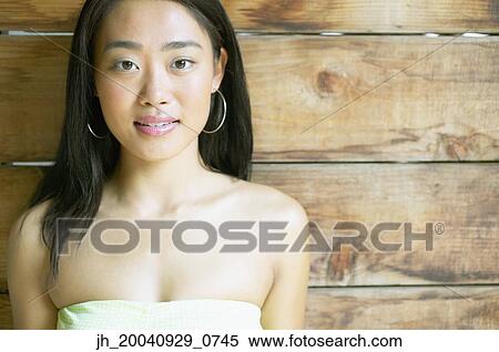 Portrait of a young woman smiling View Large Photo Image Stock Photography - Portrait of a young woman smiling. Fotosearch