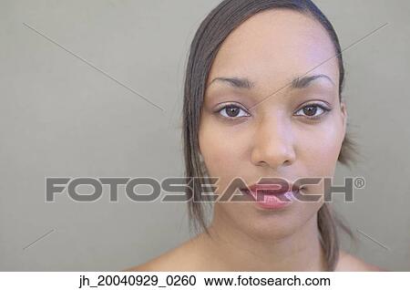 Stock Image - Portrait of a young woman. Fotosearch