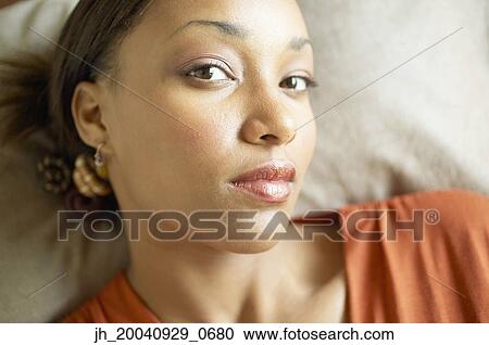 Stock Image - Portrait of a young woman. Fotosearch