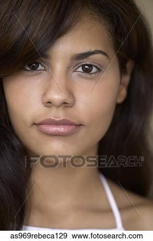 Portrait of a young woman View Large Photo Image Stock Photo - Portrait of a young woman. Fotosearch