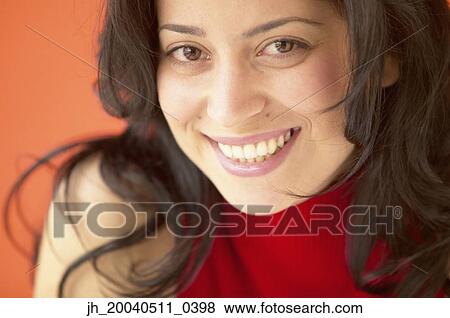 Portrait of young woman smiling View Large Photo Image Stock Photo - Portrait of young woman smiling. Fotosearch