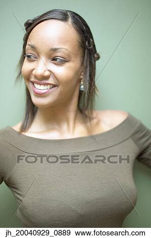 Stock Photo - Young woman smiling. Fotosearch