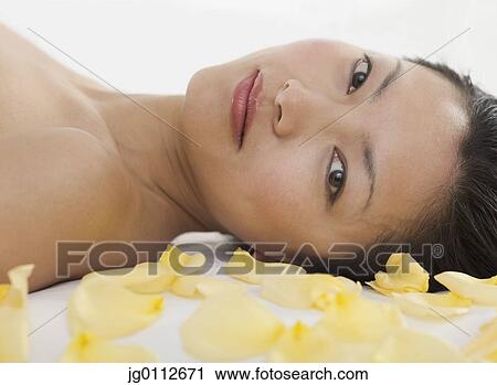 Close-up of a mid adult woman smiling View Large Photo Image Stock Image - Close-up of a mid adult woman smiling. Fotosearch