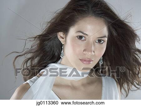 Close-up of a young woman View Large Photo Image Stock Image - Close-up of a young woman. Fotosearch