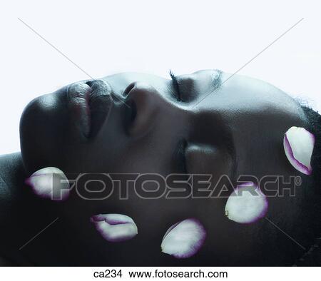 Close-up of a young woman's face View Large Photo Image Picture - Close-up of a young woman's face. Fotosearch